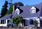 Crescent City, California Bed and Breakfast: You will be surrounded by natural beauty at Castle Island. The easy beach access offers guests the chance to explore tide pools and view spectacular sunsets. Bicycles are available for riding along Pebble Beach.  Two guest rooms, one upstairs with a separate sitting area, and one downstairs, are decorated in country charm and offer a nice view of our wooded acreage.