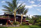 Hale Makamae Bed & Breakfast is a plantation style house nestled between palms and fruit trees in the Keahialaka Rain Forest near Pahoa, Hawaii.