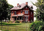 Maquoketa, Iowa Bed and Breakfast: Romantic moments in Victorian elegance. That is why guests make return visits to Squiers Manor. The Manor brings together the romance of the Victorian era with many modern comforts such as queen-size beds, single and double jacuzzis, in-room TV, phone and coffee. There are also 3 luxurious, romantic suites where breakfast is served in your room. From beautiful antique decor to delicious desserts and a gourmet breakfast, Squiers Manor has much to offer.
