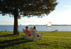 Oxford, Maryland (MD) Bed & Breakfast: Chesapeake Bay Romantic B&B featuring waterfront rooms with porches, million dollar views, a private beach, and great sunsets. Just 7 miles to St. Michaels when you take the car ferry. Most of our Oxford bed and breakfast rooms at Sandaway have screened porches overlooking the water. All B&B guest rooms have private baths and are decorated with comfortable country furnishings. Sandaway Bed and Breakfast is a romantic choice for a Chesapeake Bay getaway.
