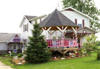 Osseo, Michigan (MI) Bed & Breakfast: Choose from four delightful guestrooms. Wake to a delicious continental breakfast each morning. Come enjoy swinging on the front porch, walking down country roads, playing cards on the deck, resting on the sandy beach by the pond, and then end the day by relaxing in our Jacuzzi. Beautiful sunsets are awaiting you.