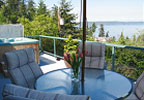 Relax on your secluded deck with spectacular views of the Olympic Mountains and Puget Sound. While soaking in your private hot tub enjoy watching the sunset and observe the ferryboats as they transit between the islands and Seattle.